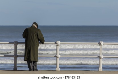 Old Man With Coat And Hat