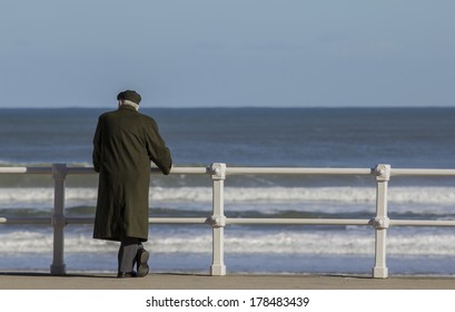 Old Man With Coat And Hat