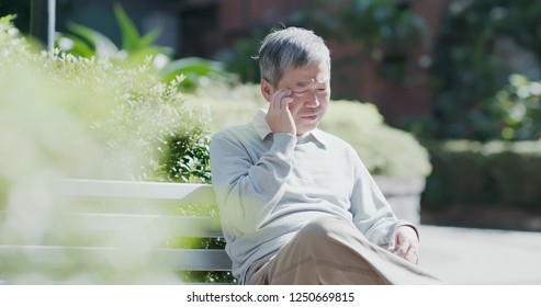 Old Man Depressed And Forget Something Outdoor