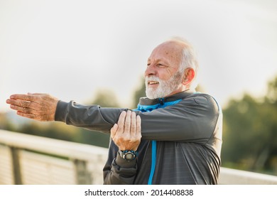 Old Man Doing Physical Exercise Stretching For A Better Quality Of Life