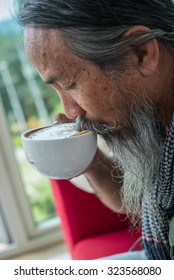 Old Man Drinking Coffee