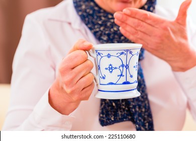 Old Man Drinking Tea To Cure Bad Cold Or Flu At Home