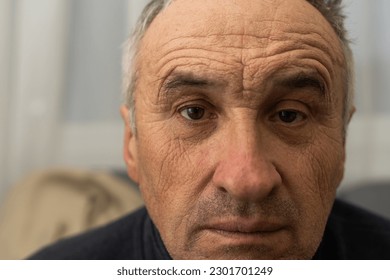 old man face part closeup eyes looks at camera - Shutterstock ID 2301701249