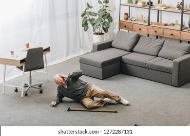 Old Man Falled Down On Floor Of The Room