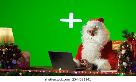 Old man father Christmas reading wishes for toys against to mockup copy space, sitting at the North Pole cabin before leaving for Christmas journey. Santa spreading x mas spirit. Camera B. - Powered by Shutterstock