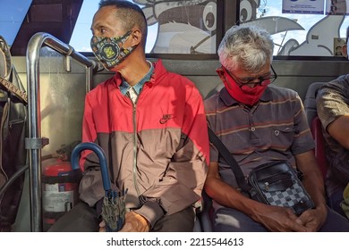 An Old Man Fell Asleep On The Bus On His Way To Work. Semarang, Indonesia - October 18 2022.