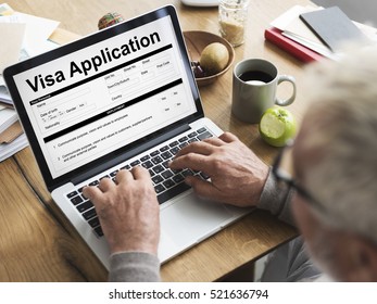 Old Man Filling Out Online Visa Application