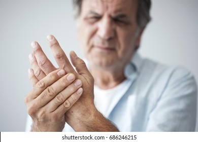 Old Man With Finger Pain