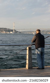 Old Man Fishing In Istanbul Bosphorus