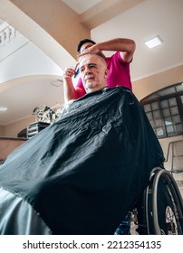 Old Man Getting A Haircut