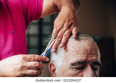 Old Man Getting A Haircut