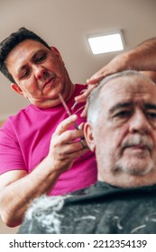 Old Man Getting A Haircut