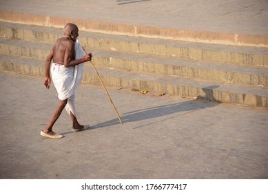 An Old Man Going Towards Temple For His Prayer After Washing His Hands & Feets In River. Shot At Alandi In Pune On 17 Feb 2020.