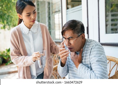 Old Man With Gray Hair Choke And Cough, So Private Nurse Give Him The Glass Of Water.