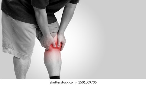 The old man had knee pain as a result of osteoarthritis on a white background, With copy space and clipping path