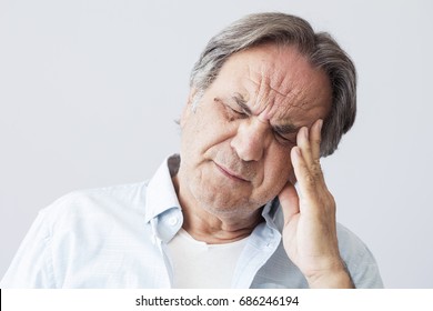 Old Man With Headache