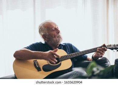 The Old Man And His Guitar In The House