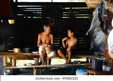 Old Man And Kid Poor Family Eating At Home Countryside Thailand.