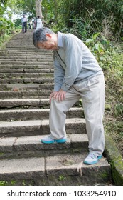 Old Man With Knee Problem In The Moutain