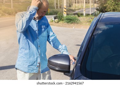 The Old Man Left The Car Keys In The Car, Accidentally Locking The Keys Inside The Car.