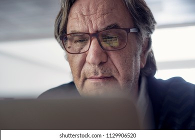 Old Man Looking At Computer Screen