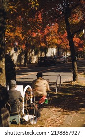 Old Man Painting On The Streets Of Osaka During Autumn