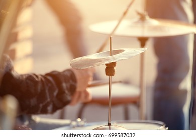 Old Man Playing Drums On Street