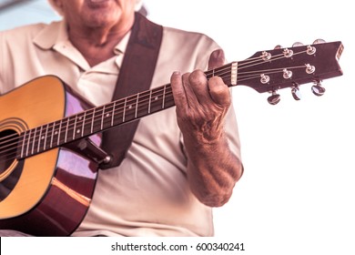 Old Man Playing Guitar