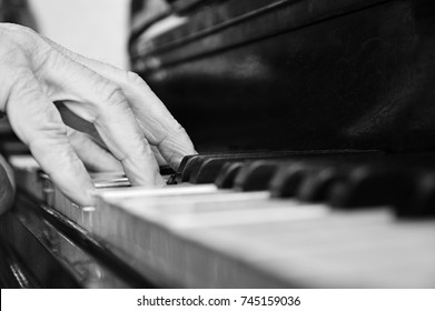 Old Man Playing Piano