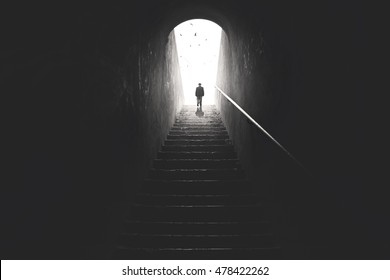 Old Man Raising Stairs To Reach The City