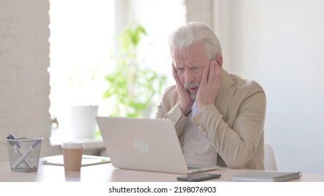 Old Man Reacting To Loss While Using Laptop