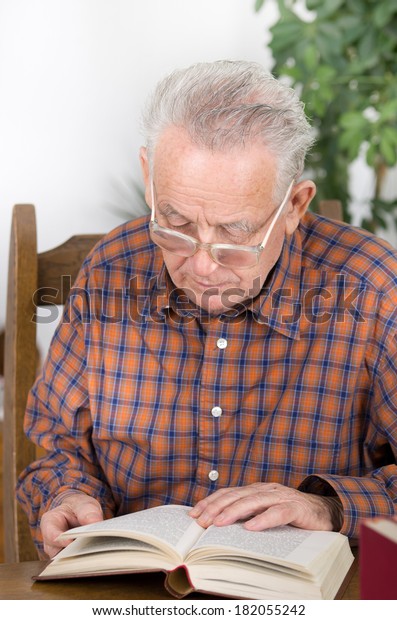 old person reading glasses