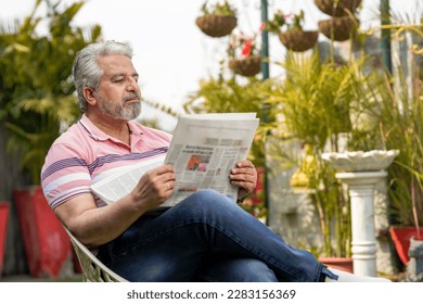 Old man reading news paper. lifestyle concept. - Powered by Shutterstock