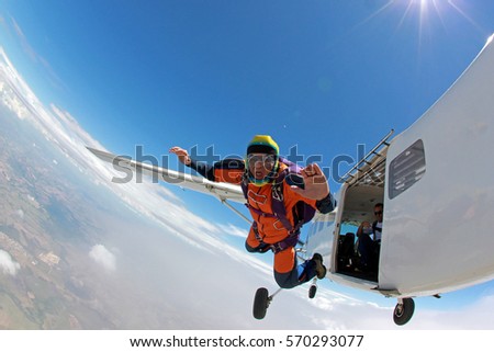Old man realizing a dream, jumping from a plane Foto stock © 