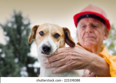 Old Man Rescuing Dog From Natural Disaster