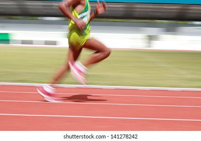 The Old Man Is Running On The Running Track.