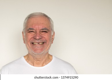 Old Man Senior Face Closeup Missing Tooth Smile Proper Tooth Overexposed Not In Focus