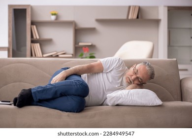 Old man sitting at home - Powered by Shutterstock