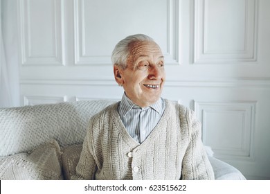 Old Man Sitting And Posing In The Studio, Laughing 90 Year Old Senior Man Candid Portrait