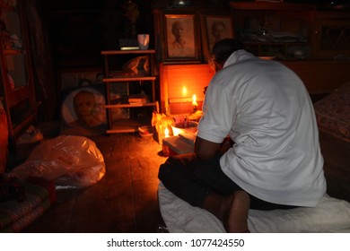 Old Man Sitting In Prayer Room