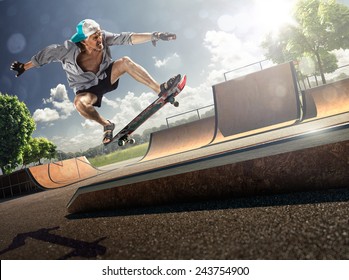 The Old Man Is Skating On Skateboard In Skate Park