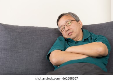 Old Man Sleeping On Sofa