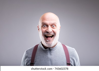 Old Man Smiling In A Very Exaggerated Facial Expression