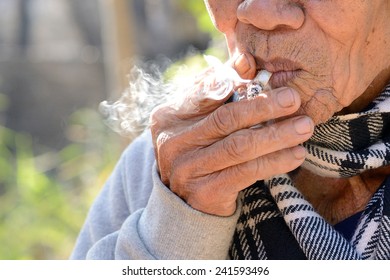 Old Man Smoking