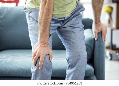 Old Man Suffering From Knee Pain