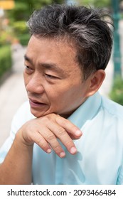 Old Man Sweating Due To Hot Weather, Heatstroke, Strong Uv Light Or Sunburn