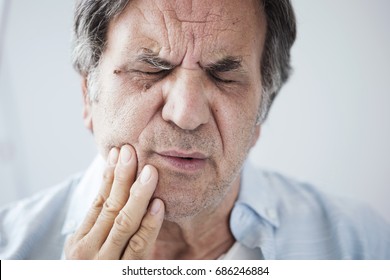 Old Man With Toothache