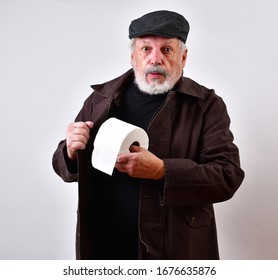 Old Man In A Trench Coat Is Offering To Sell Toilet Paper At Exorbitant Prices.
Coronavirus Panic Buying, Black Market Selling Of Toilet Paper