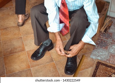 Old Man Tying Shoes Indoor