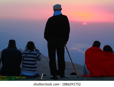 Old Man Watching Sunset. Group Scenery Viewing
